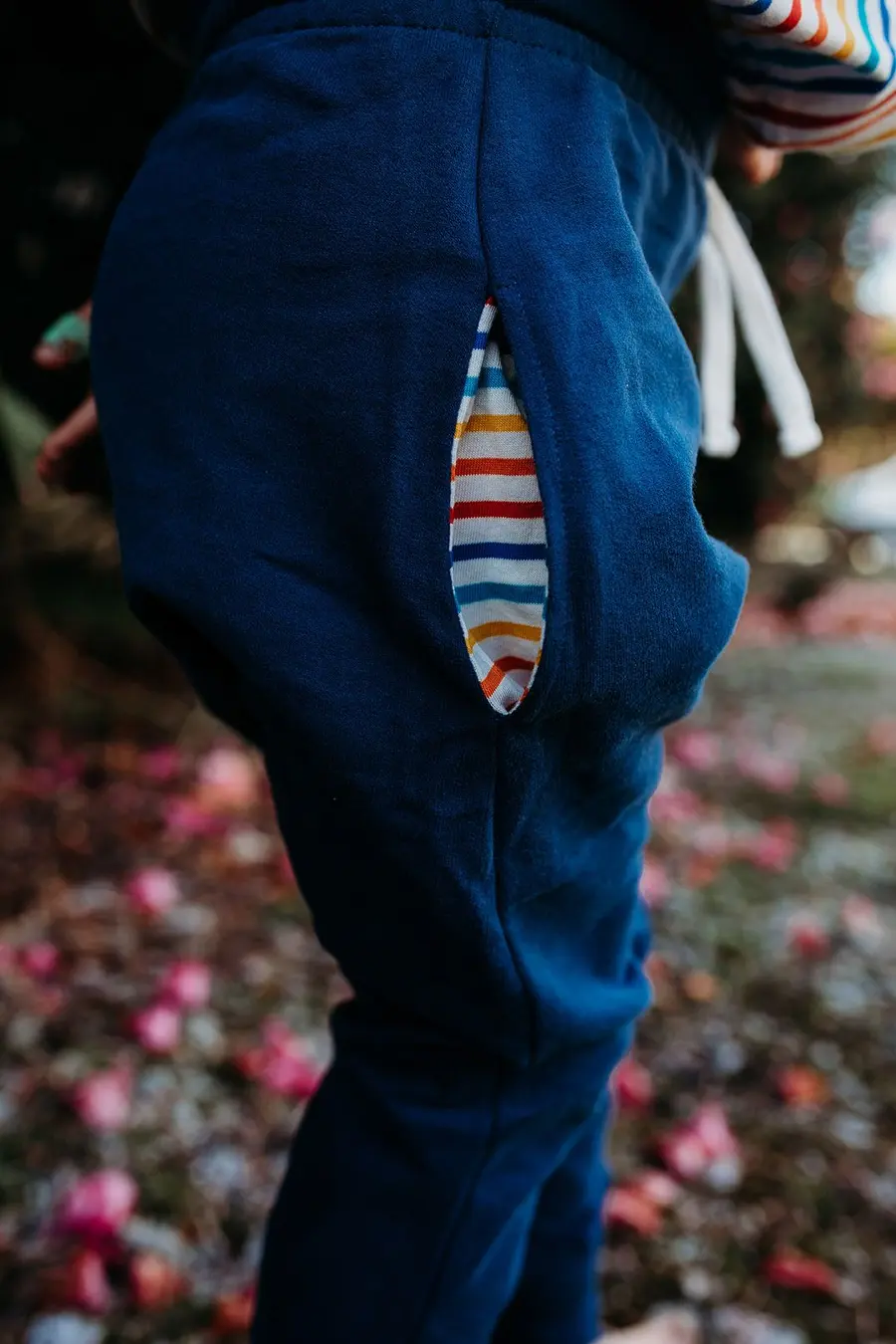 Navy QT children’s joggers with a striped reinforced knee detail